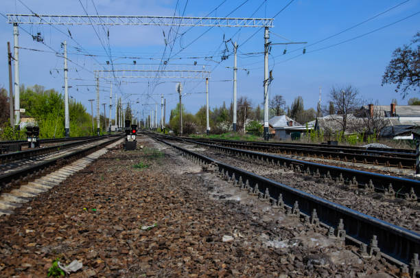istock Red signal on a semaphore on railroad track 901374620