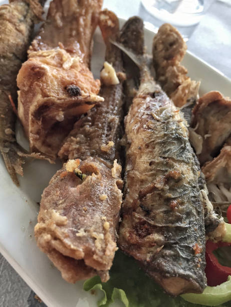 istock fried fishes on plate 901374716