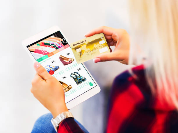 young woman shopping online with tablet computer and credit card - shoe women fashion shoe store imagens e fotografias de stock