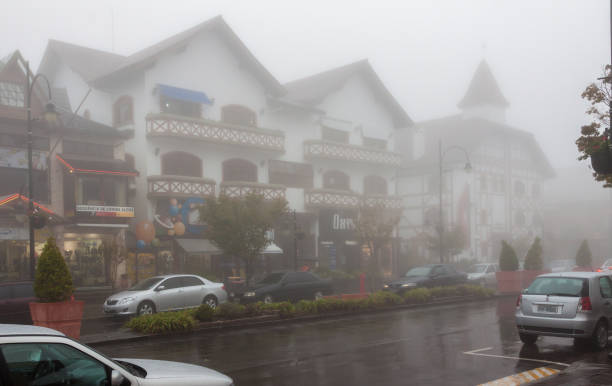 The typical german style half timber buildings in downtown Gramado under the rain, Rio Grande do Sul, Brazil.