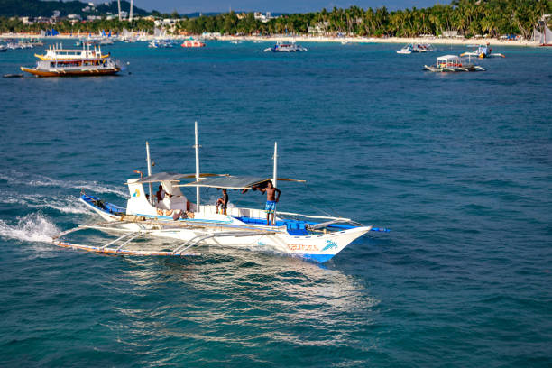 BORACAY ISLAND, PHILIPPINES - November 18, 2017 : Hopping, Dive boats in the Boracay sea