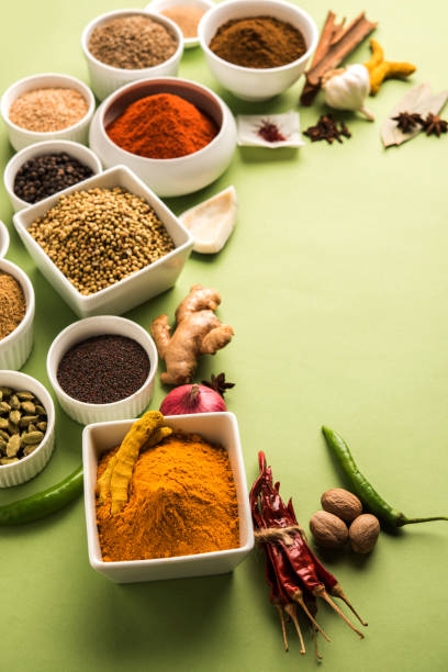 istock Indian Spice Powder over green background, selective focus 901385954