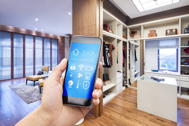 istock smart phone with smart home with modern wardrobe 901390234