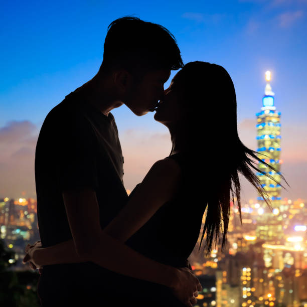 istock silhouette of couple 901400376