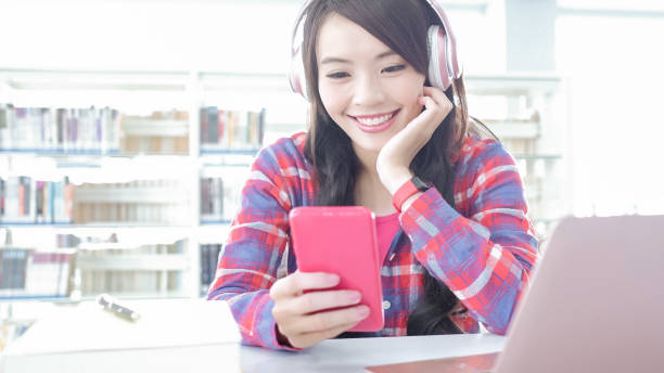 istock woman student in the library 901405686