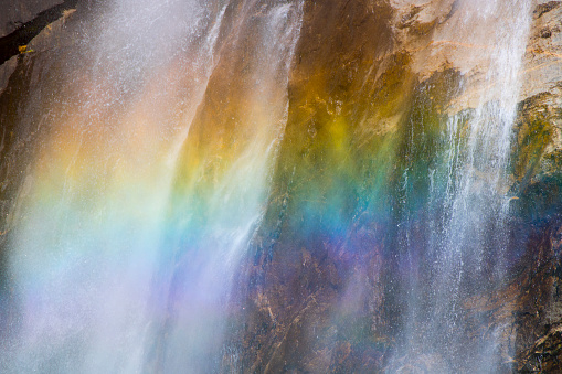 Close up of horizontal stripes in rainbow located in Yosemite Falls