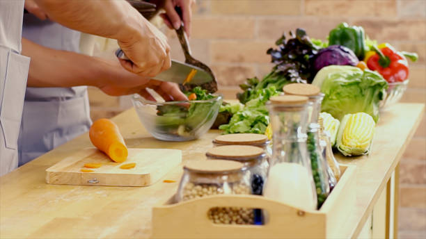 istock Young Asian Couple in the Kitchen 901420530