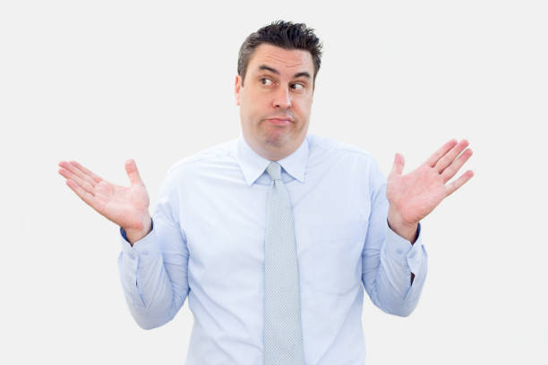 istock Doubtful Mature Business Man Throwing up Hands 901420546