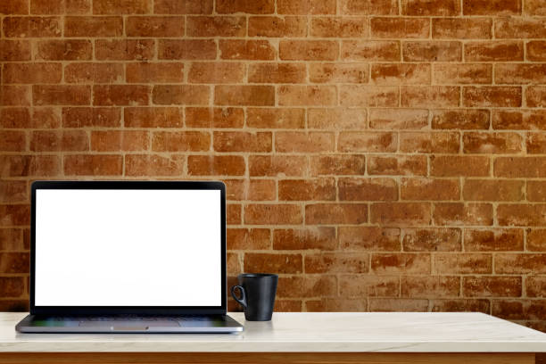 istock Mock up workspace with laptop computer and coffee mug at home or studio 901420948