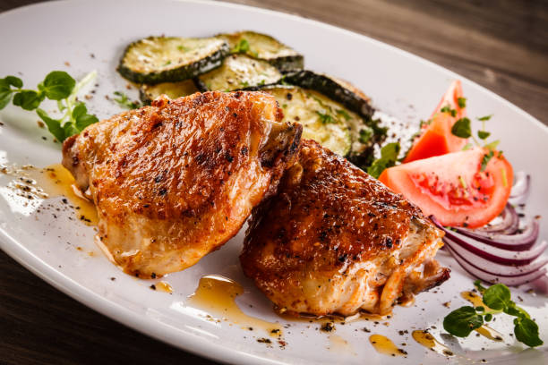 istock Barbecued chicken thighs with vegetables 901421264