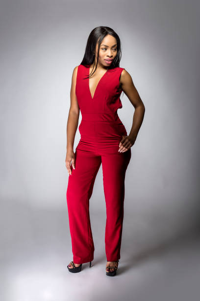 istock Spring Fashion Black Female Model with Red Pantsuit 901436144
