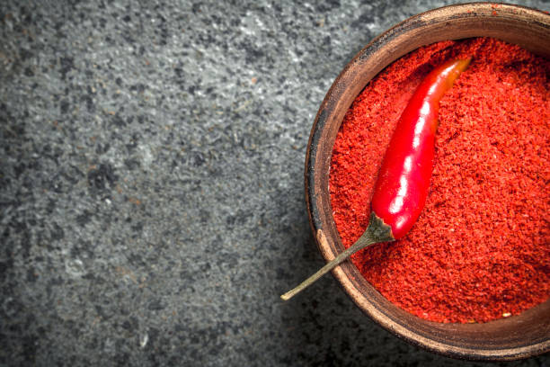 istock Ground red pepper in a bowl. 901440594