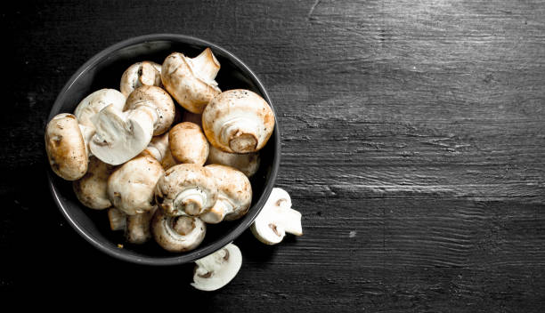 istock Fresh mushrooms in a bowl. 901441016