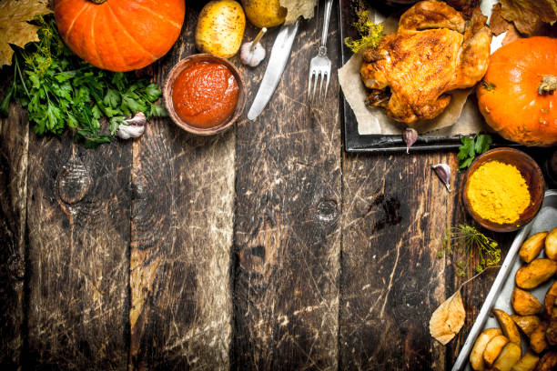 istock Fried chicken with potatoes, spices and sauce. 901444106