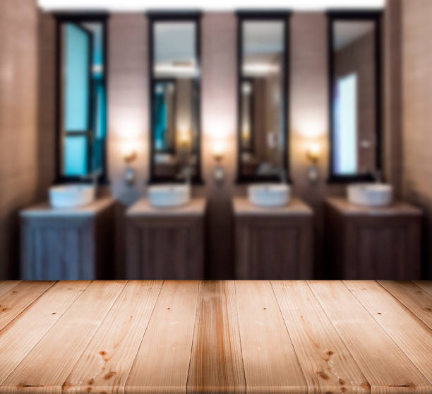 istock modern sink hand watching in toilet room 901445572