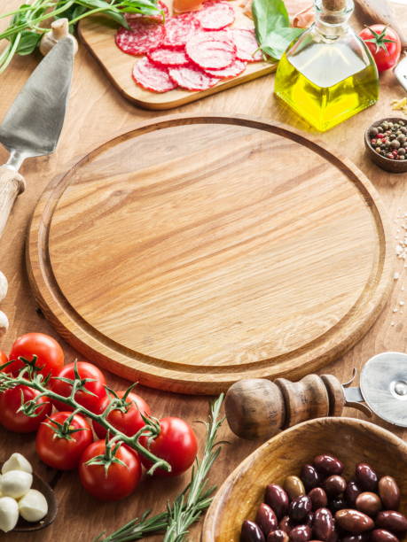 istock Pizza with mushrooms, salami and tomatoes. Top view. 901449246