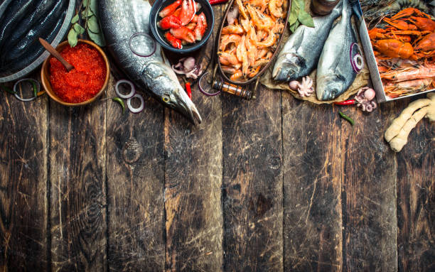 istock Different seafood with shrimps and red caviar. 901451876