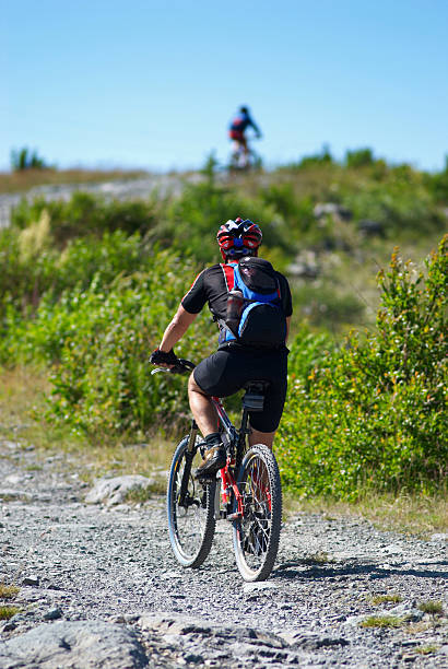 istock Two bikers uphill on rural road 90146360