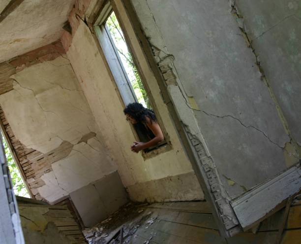 istock Abandoned House with Woman 90146411