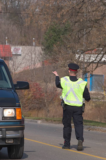 istock Police Officer Directs Traffic 90147346