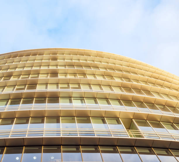 istock Glass building against the sky 901476778