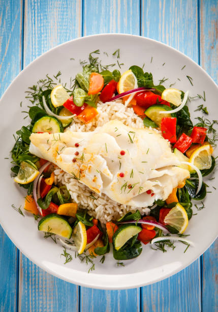 istock Roast fish with white rice and vegetables 901478860
