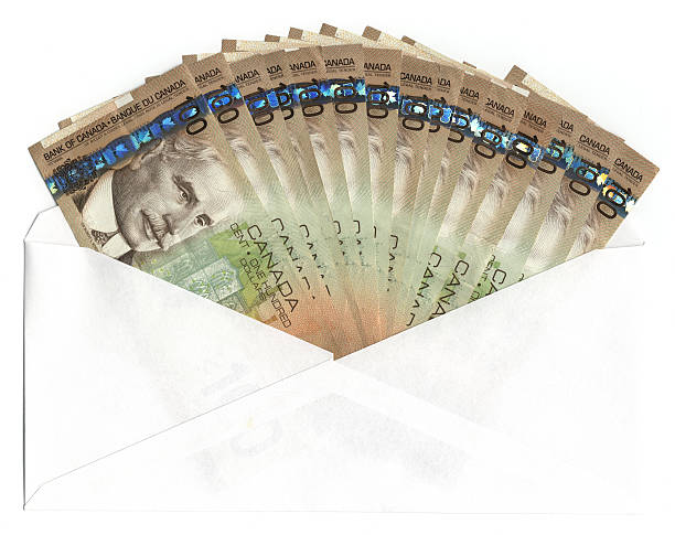 Busta con banconote da cento dollari canadesi - foto stock