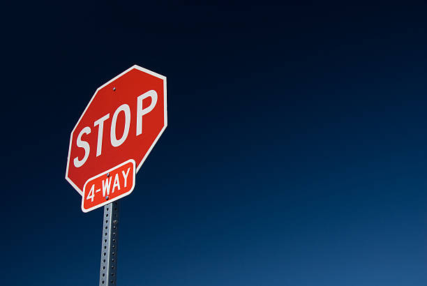 Four way stop sign  stop single word stock pictures, royalty-free photos & images