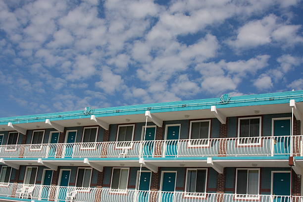 Cars are parked at a motel in Mackinaw City, Michigan, USA on a cloudy day.