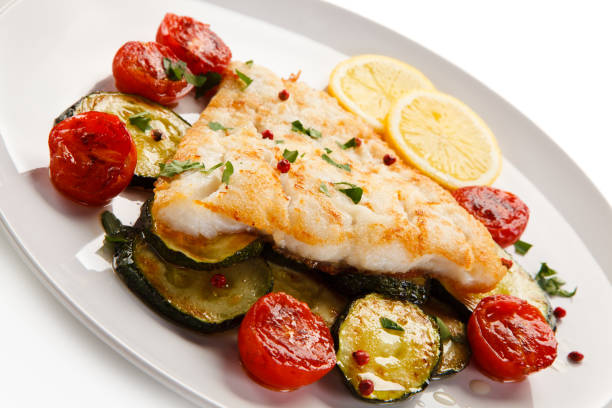 istock Fish dish - fried fish fillet and vegetables 901484302