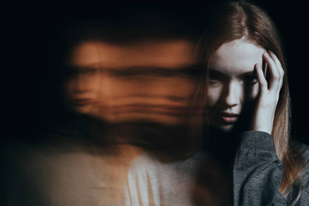 Young girl with hallucinations Young girl addicted to drugs with hallucinations against blurred background illusion photos stock pictures, royalty-free photos & images