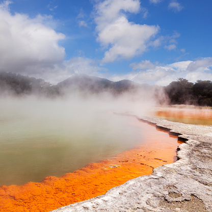 18 October 2013: Rotorua, New Zealand - Steaming water at the Champagne Pool, Waiotapu Thermal Reserve, Rotorua, New Zealand.