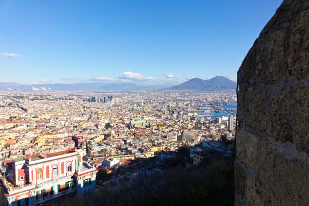 istock Vesuvio and Naples waterfront with rocks and boats 901493916