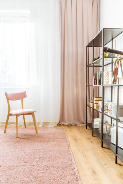 istock Pink wooden chair in interior 901494086