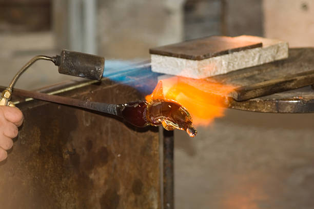 istock Glass Blower Forming a Dolphin 90149441
