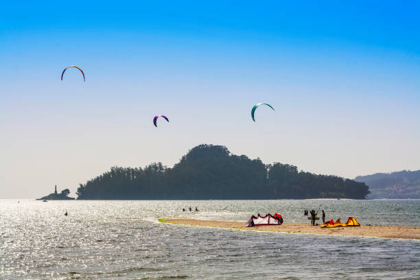 istock Kitesurfing in front of Tambo island 901496846