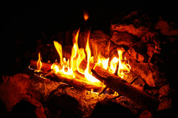 istock Flame on a black background in natural conditions at night. 901497604
