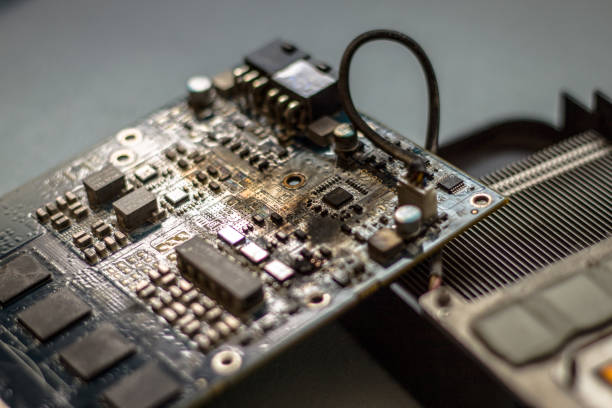 istock Disassambled and damage computer grafic card circuit board. Damaged by high temperature 901497974