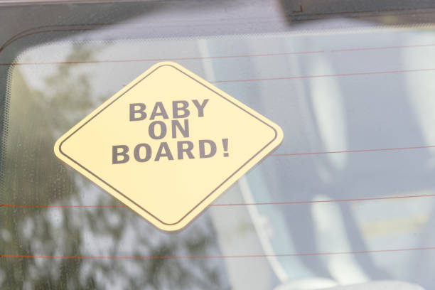 istock Baby On Board sticker on the car back windows 901500944