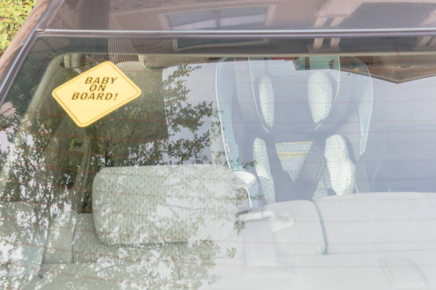 istock Baby On Board sticker on the car back windows 901501136