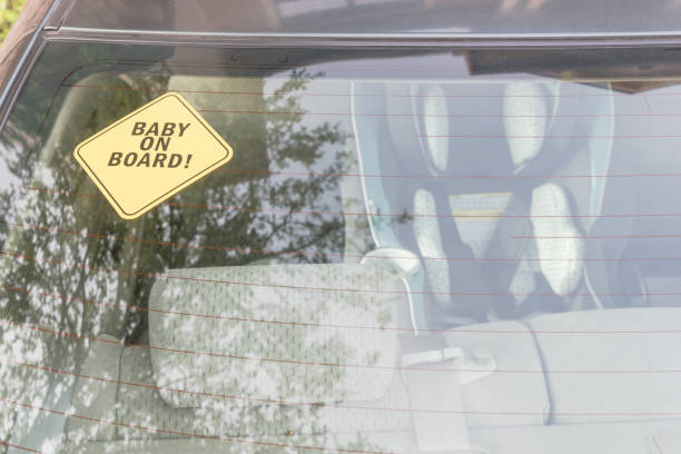 istock Baby On Board sticker on the car back windows 901501226