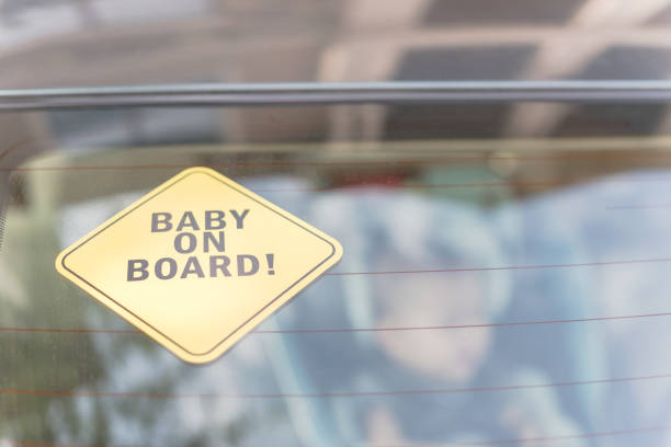 istock Baby On Board sticker on the car back windows 901501840
