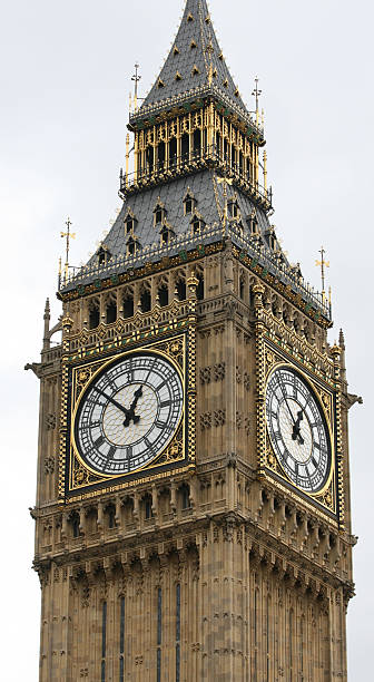 istock London's Big Ben's clock faces close-up portrait view 90150193