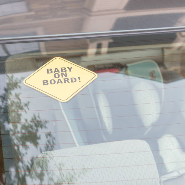 istock Baby On Board sticker on the car back windows 901502122