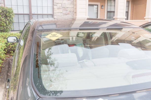 istock Baby On Board sticker on the car back windows 901502194