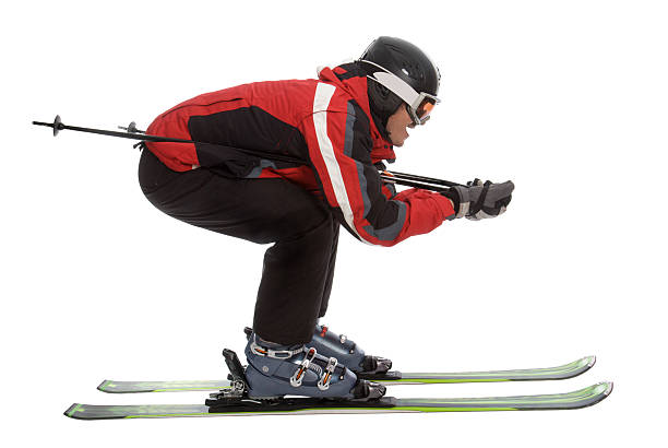 Skier man in aerodynamic pose stock photo