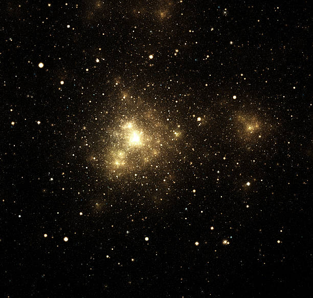 Close-up of shiny nebula with surrounding stars in galaxy stock photo