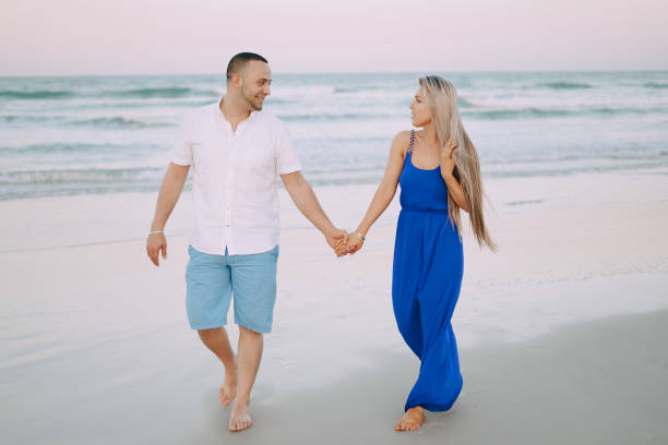 istock beautiful family on the beach 901503202