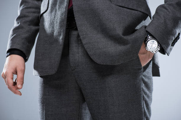 istock businessman in formal suit with hand in pocket 901505654
