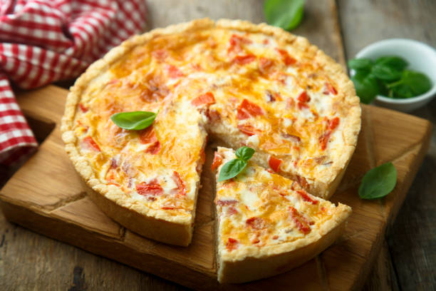 Savory pie Homemade tomato and bacon pie quiche stock pictures, royalty-free photos & images